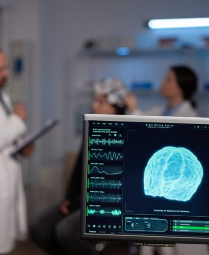 Neuroscience doctor holding clipboard showing treatment against brain disease to patient with eeg headset. Woman sitting in neurological scientific laboratory treating nervous system dysfunctions.