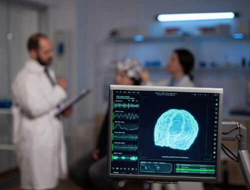 Neuroscience doctor holding clipboard showing treatment against brain disease to patient with eeg headset. Woman sitting in neurological scientific laboratory treating nervous system dysfunctions.